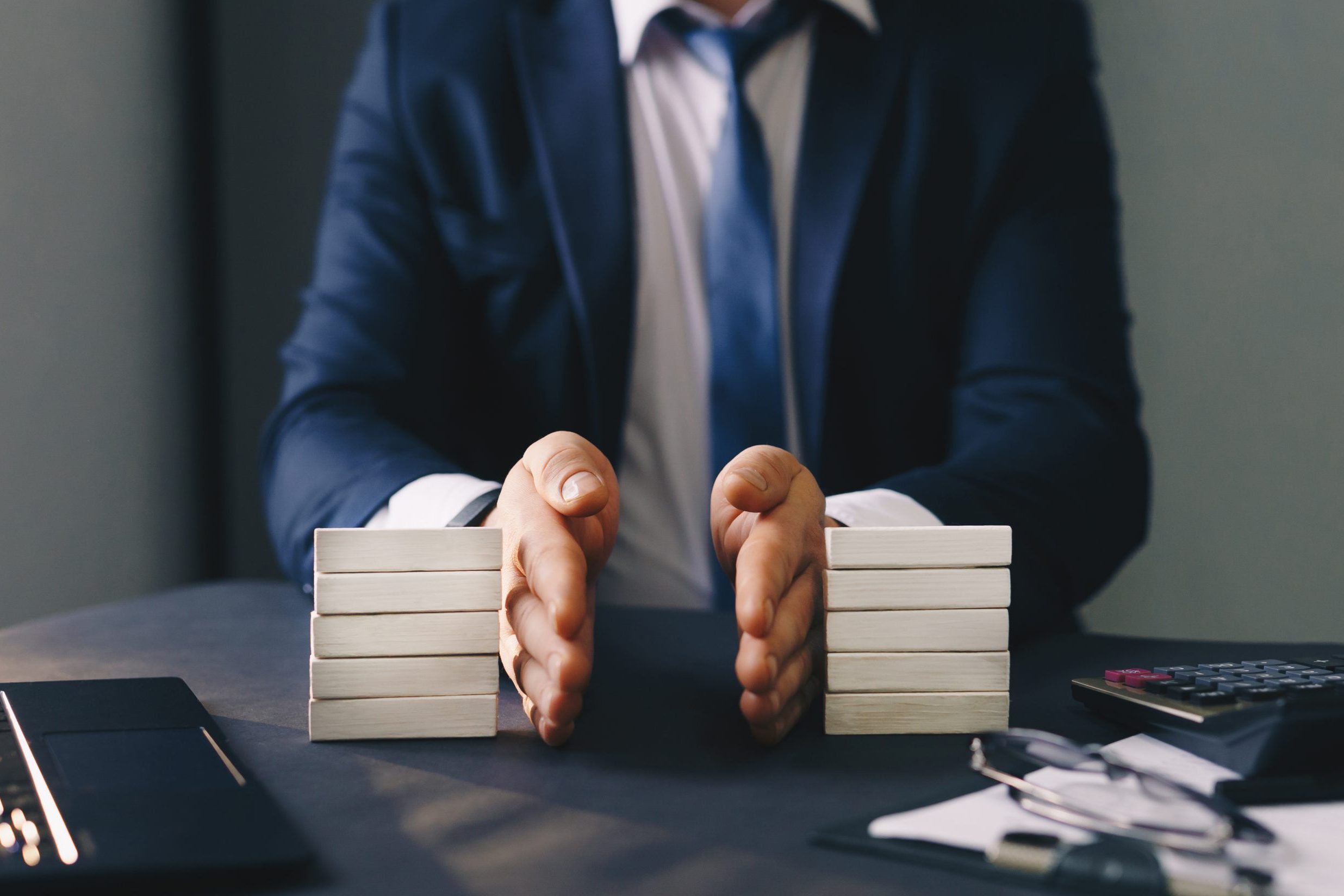 Businessman,Separates,Wooden,Block.,Property,Division.,Divorce,And,Legal,Services.